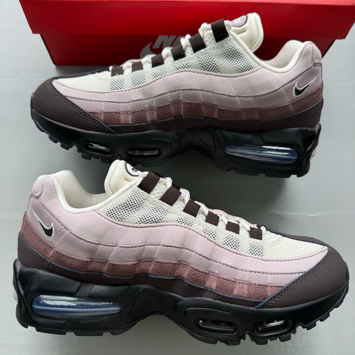 Nike black Air Max 95 trainers with big bubble design and light violet accents.