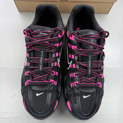 Nike P-6000 trainers black pink metallic detailing and logo accents.
