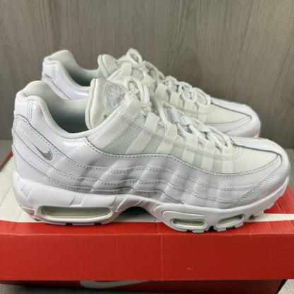 Nike Air Max 95 trainers white mesh upper with signature swoosh logo and reflective details.