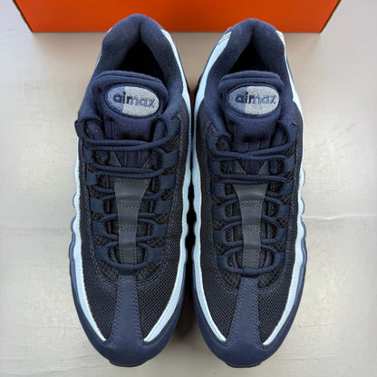 Nike Air Max 95 blue trainers with big bubble sole and logo detailing.