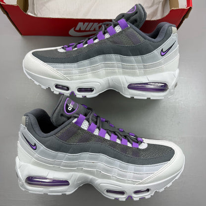 Nike Air Max 95 grey trainers with big bubble sole and logo detailing.