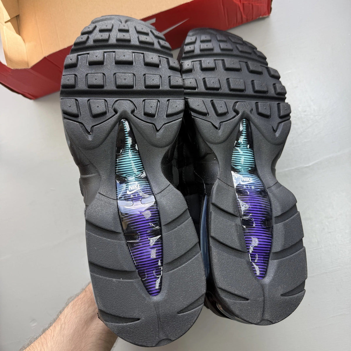 Nike Air Max 95 black sneaker with big bubble design and grape dusty cactus accents.