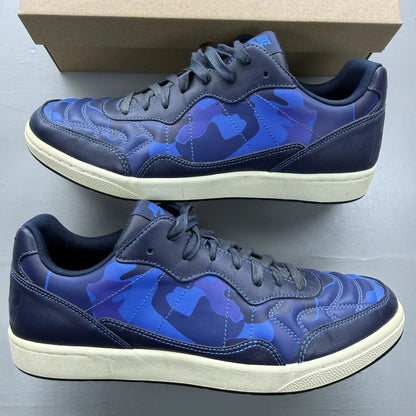 Nike blue trainers with obsidian camo pattern and logo detail.
