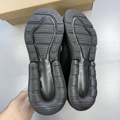 Nike Air Max 270 black trainers with logo detailing and breathable mesh upper.