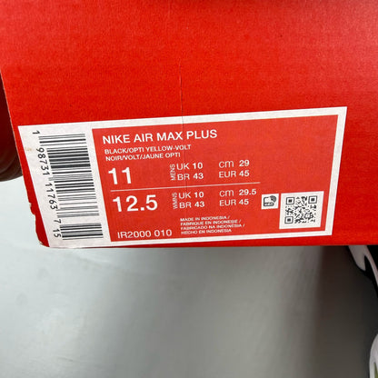 Nike Air Max Plus TN red trainers with black accents and vibrant volt detailing.