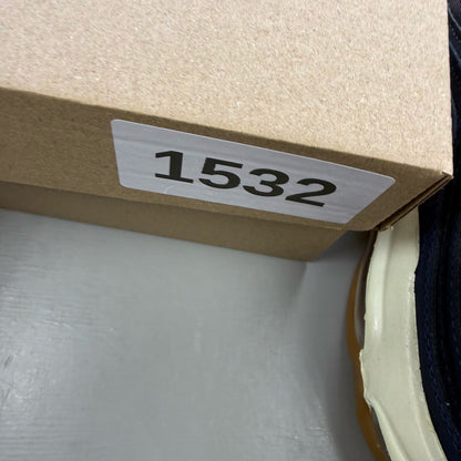 Nike Air Max 97 trainers blue with obsidian navy accents and signature swoosh logo.