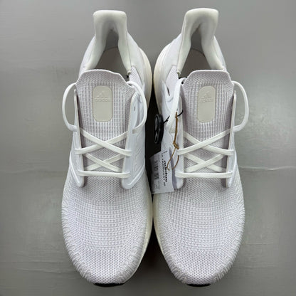 Adidas Ultraboost 20 white trainers with cloud cushioning and iconic three-stripe logo.