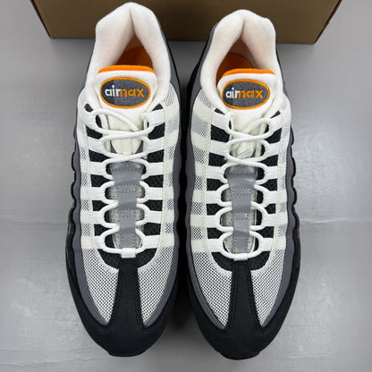 Nike Air Max 95 grey trainers with big bubble design and signature swoosh logo.