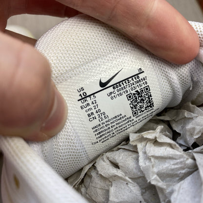 Nike Air Max Plus TN trainers white with silver accents and visible logo.