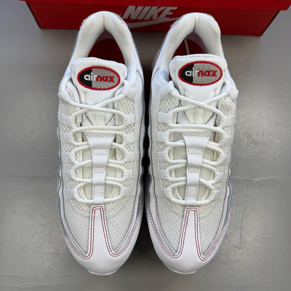 Nike trainers white with red accents and big bubble sole design.