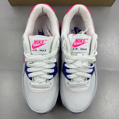 Nike Air Max 90 white trainers with purple and pink accents, featuring logo details.