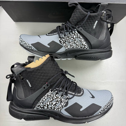 Nike black trainers with Cool Grey accents and Acronym logo details.
