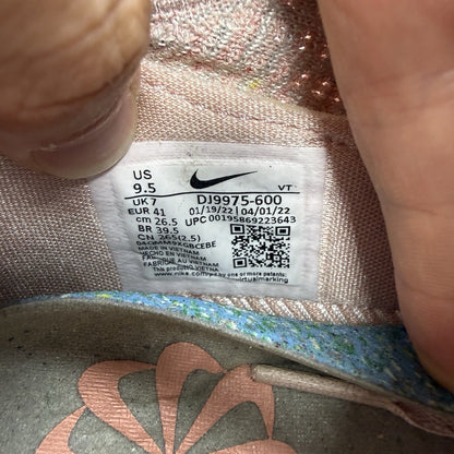 Nike Air VaporMax 2021 Flyknit pink trainers with breathable knit upper and signature logo.