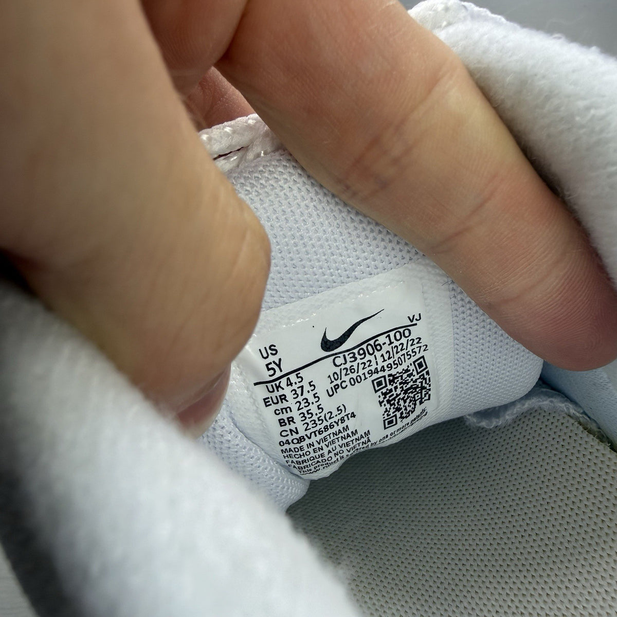 Nike Air Max 95 Recraft white trainers with distinctive layered design and air cushioning.
