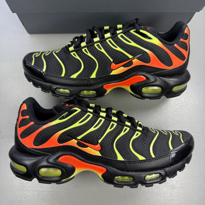 Nike Air Max Plus TN black with vibrant limelight and hyper crimson accents.