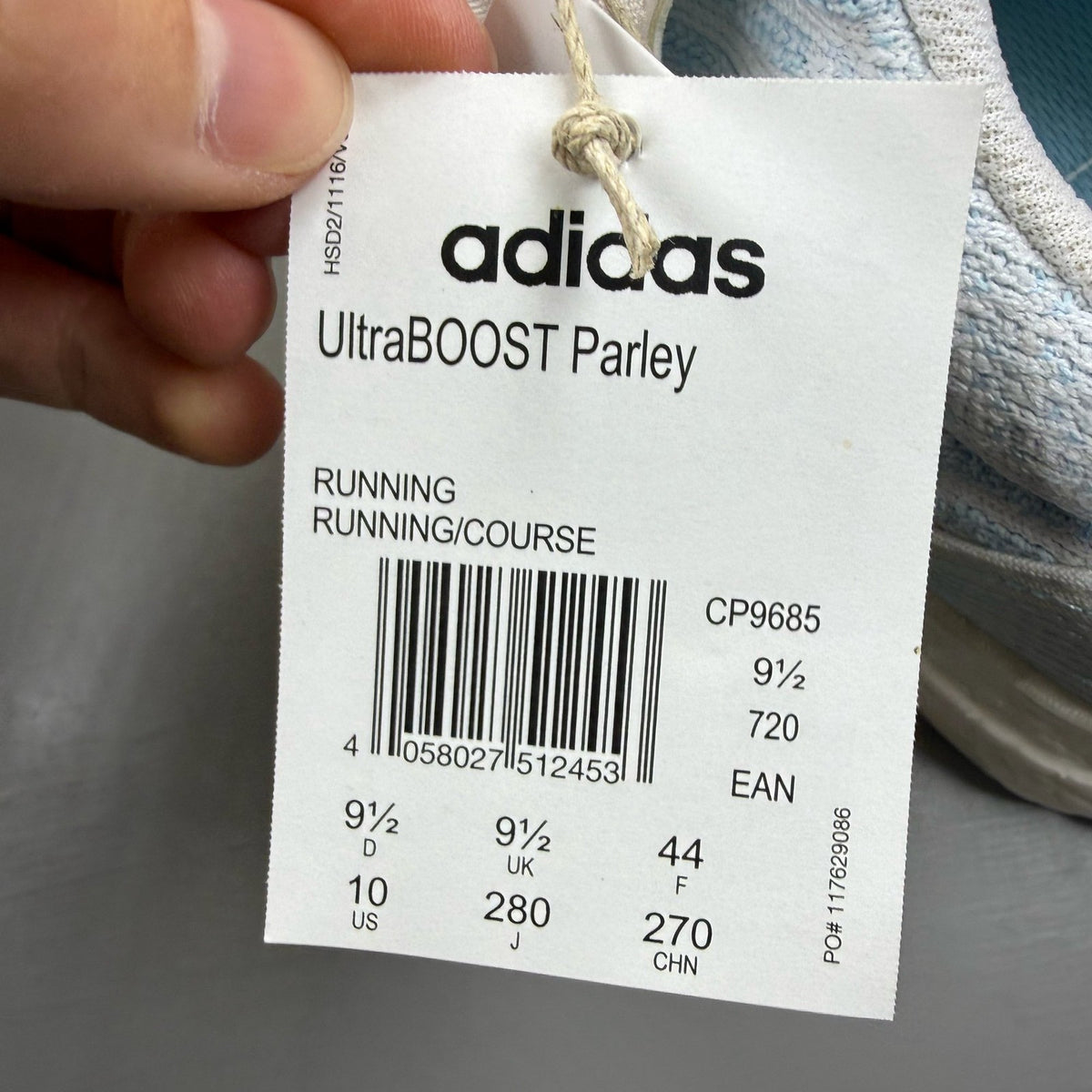 Adidas Ultra Boost 3.0 white trainers with Parley logo and breathable mesh upper.