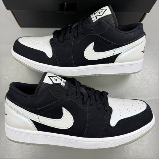 Jordan black athletic shoes with white accents and diamond pattern details.