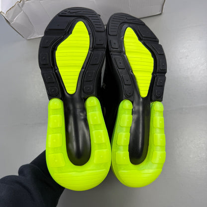 Nike running shoes black with volt neon accents and Air Max cushioning.