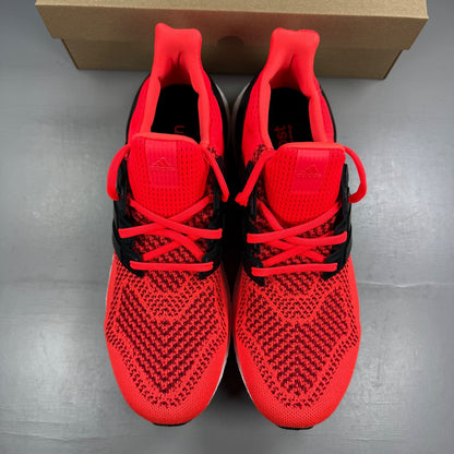 Adidas Ultra Boost trainers multi-colour with mesh upper and signature three stripes logo.