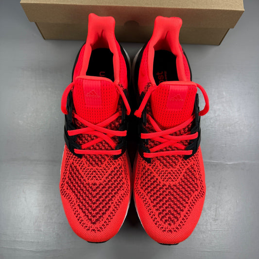 Adidas Ultra Boost trainers multi-colour with mesh upper and signature three stripes logo.