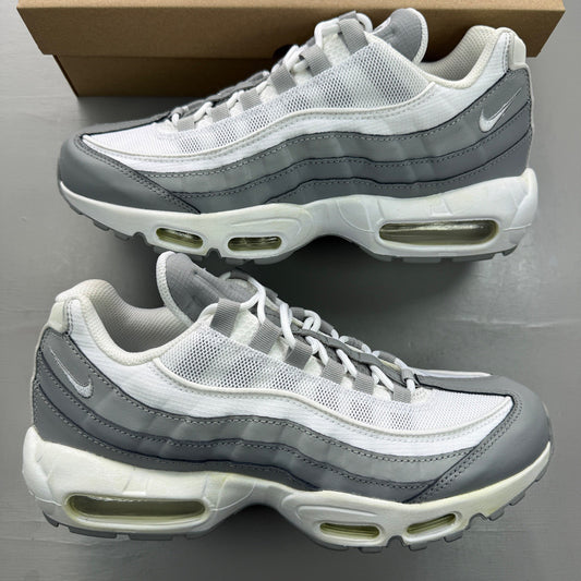 Nike Air Max 95 grey sneakers with white accents and signature logo details.