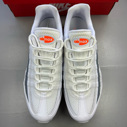 Nike Air Max 95 white trainers with grey accents and distinctive air cushioning design.