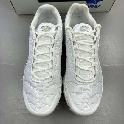 Nike Air Max Plus TN white trainers with metallic silver accents and grey detailing.