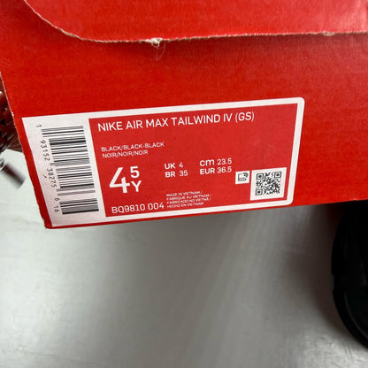 Nike black trainers mesh upper with reflective detailing and Air Max cushioning.