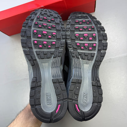 Nike P-6000 trainers grey with pink and black accents, mesh material, logo on tongue.