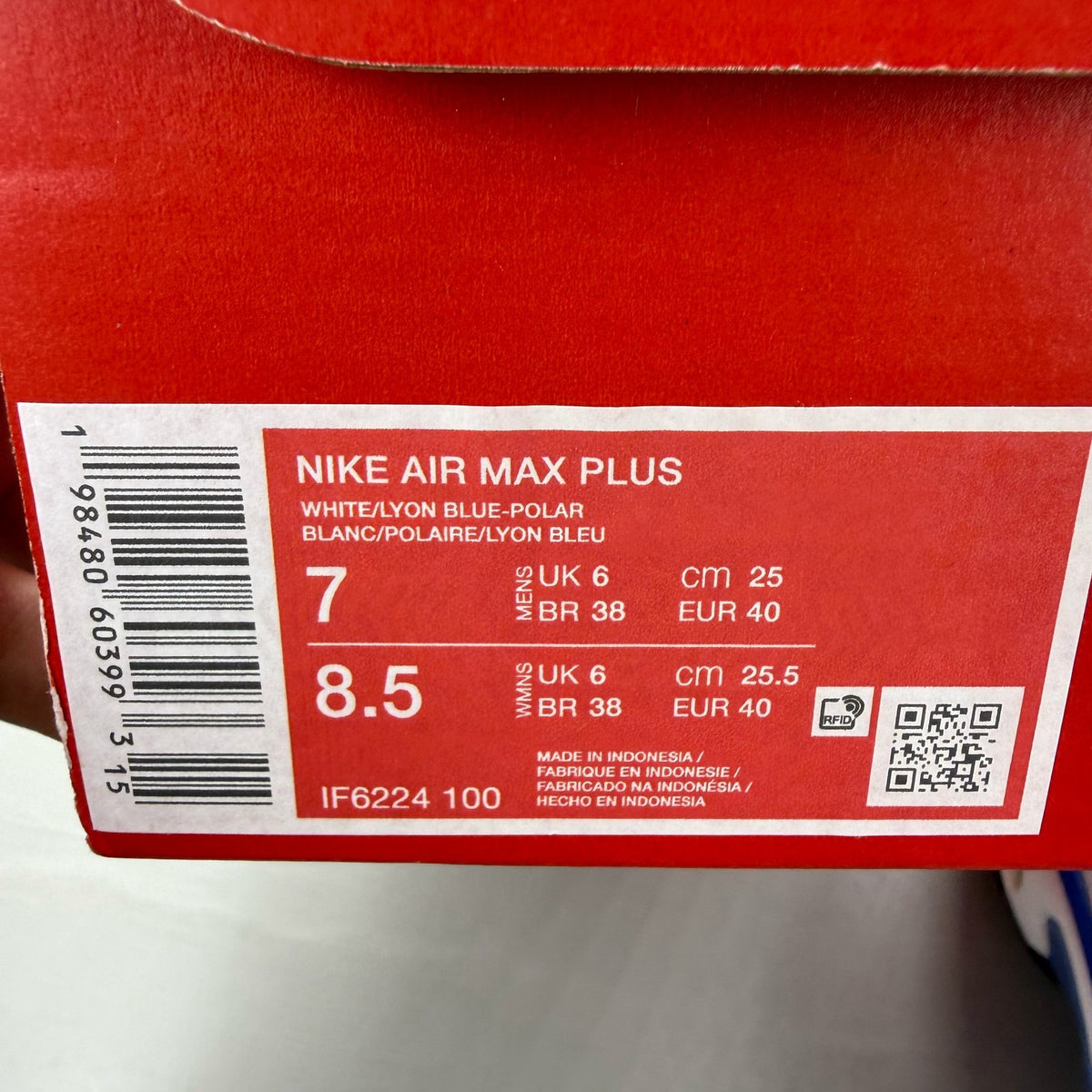 Nike Air Max Plus TN blue trainers with white accents and signature logo details.