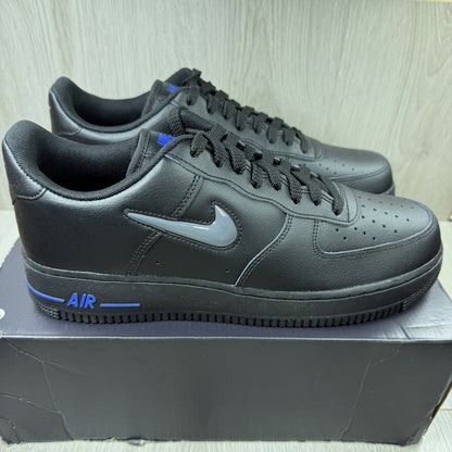 Nike black Air Force 1 Low trainers with jewel swoosh logo and grey accents.