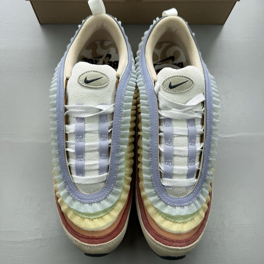 Nike Air Max 97 trainers white with pink accents and beige detailing, authentic design.