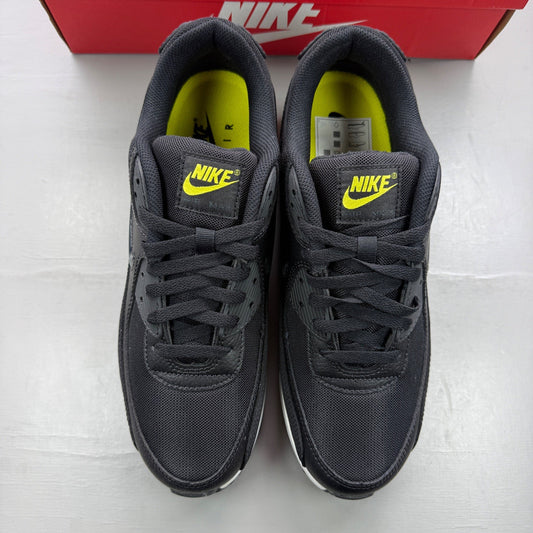 Nike athletic shoes black with yellow accents and jewel detailing, featuring a classic design.
