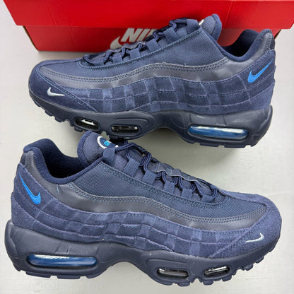 Nike Air Max 95 blue trainers with mesh upper and signature swoosh logo.