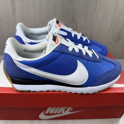 Nike trainers game royal blue with white and black accents, featuring logo detail.