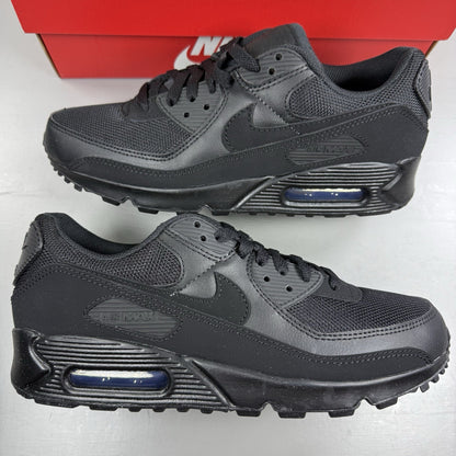 Nike Air Max 90 Recraft black trainers with textured upper and signature swoosh logo.