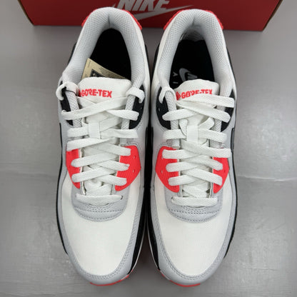 Nike Air Max 90 trainers white GORE-TEX with infrared accents and grey details.