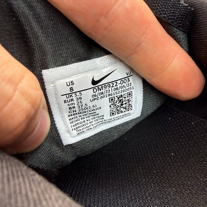 Nike black Air Max 90 Futura trainers with grey accents and logo detail.