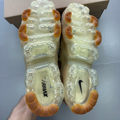 Nike Air VaporMax Plus trainers brown with mesh upper and signature swoosh logo.