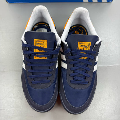 Adidas blue kids trainers with white and orange accents, featuring logo detail.