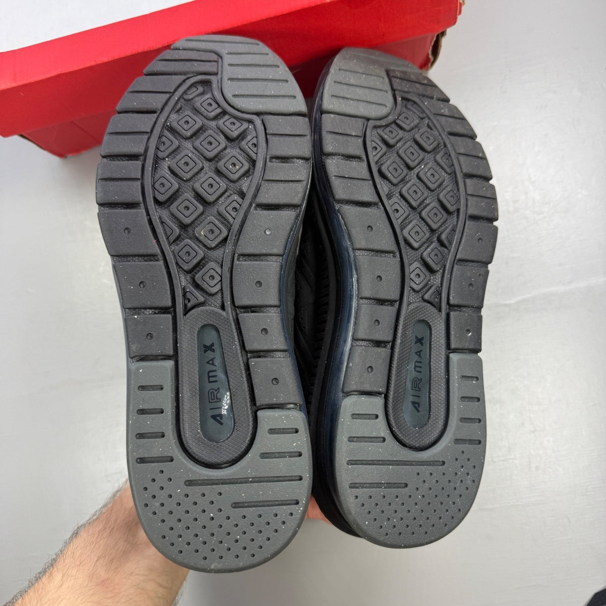Nike trainers black with sleek design and Air Max cushioning.