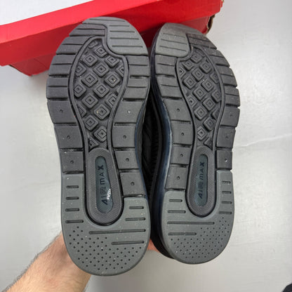 Nike trainers black with sleek design and Air Max cushioning.