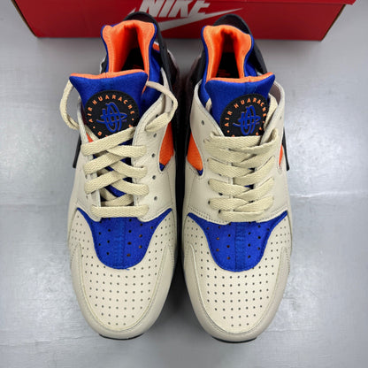 Nike athletic shoes beige with Hyper Royal accents and unique ACG Mowabb design.