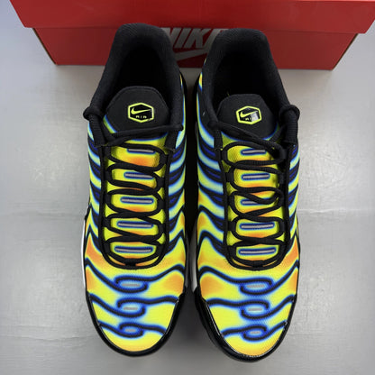 Nike trainers black with yellow heat map pattern and signature swoosh logo.