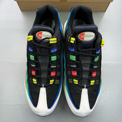 Nike black Air Max 95 trainers with hidden message detail and sleek design.