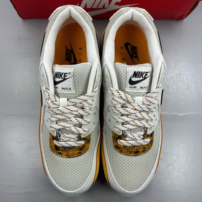 Nike beige trainers leopard tortoise shell pattern with logo detail.