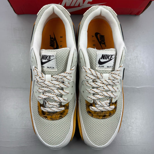 Nike beige trainers leopard tortoise shell pattern with logo detail.