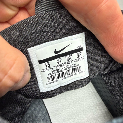 Nike black trainers with Cool Grey accents and Acronym logo details.