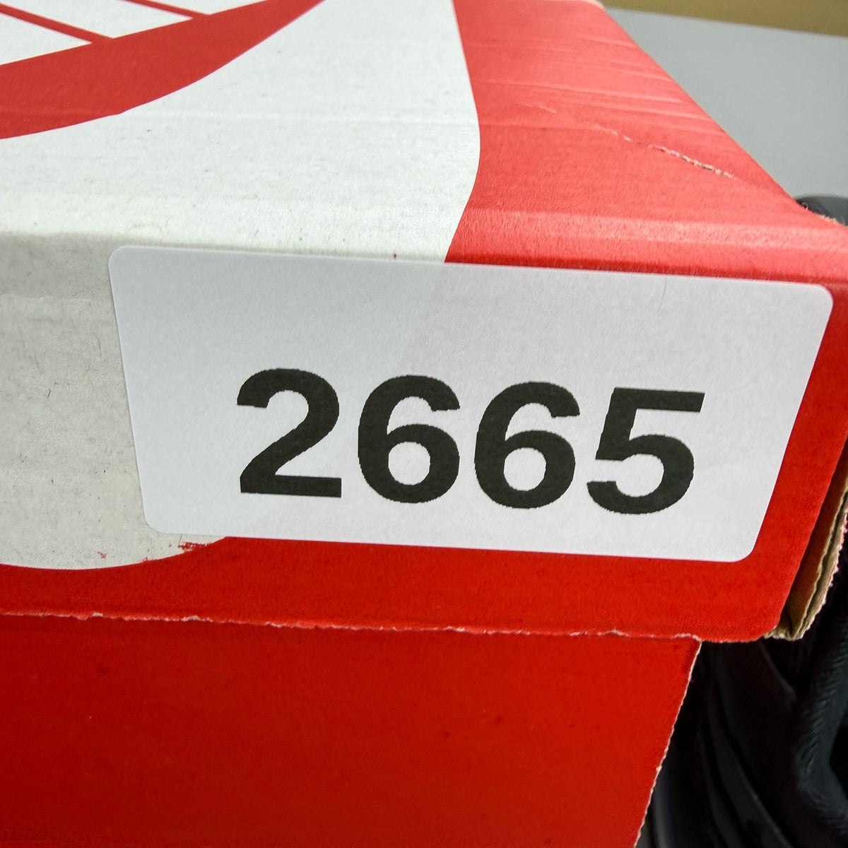 Nike Air Max 95 black trainers with big bubble sole and logo detail.