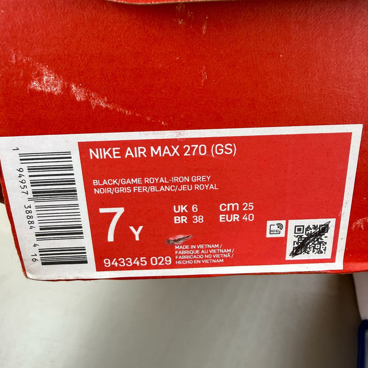 Nike Air Max 270 black trainers with game royal and white accents, mesh upper.